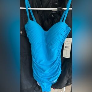 Beautiful blue color size 6 women’s whole piece swimsuit new with tags